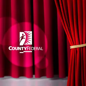 County Federal on red curtain